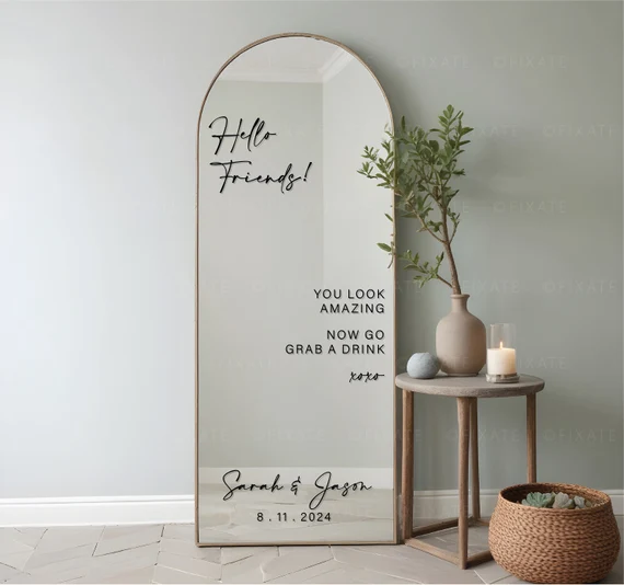 Arched mirror with personalized lettering decals