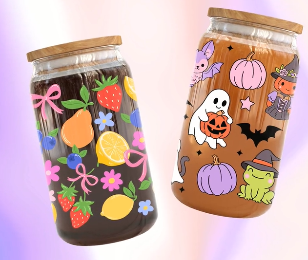 Decorated glass cups with fruit and Halloween designs